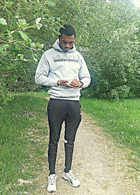 MODEL IN GREY OLS HOODIE OBEDIENCE